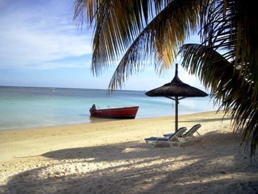 This photo, by a German photographer, hints at the remoteness of beautiful Mauritius Island (part of the Island nation of Mauritius) located about 2,000 km off the coast of Africa in the Indian Ocean.  It may be remote, but it is an "ultimate" travel destination.  Has anyone seen my husband lately?